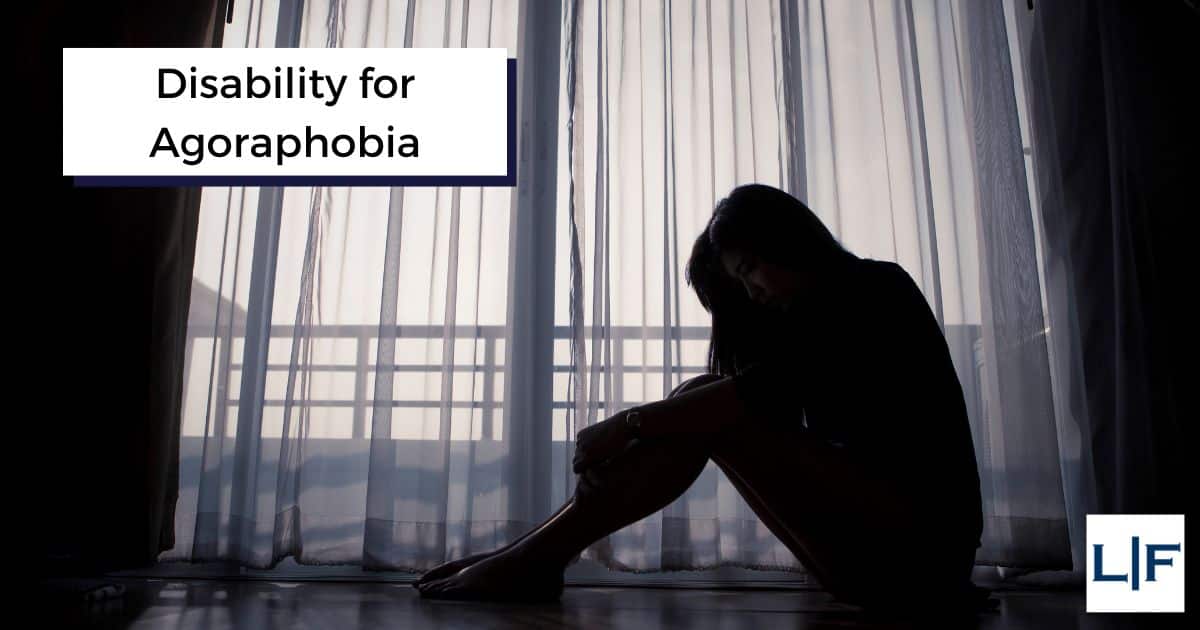 disability for agoraphobia title on person sitting by window